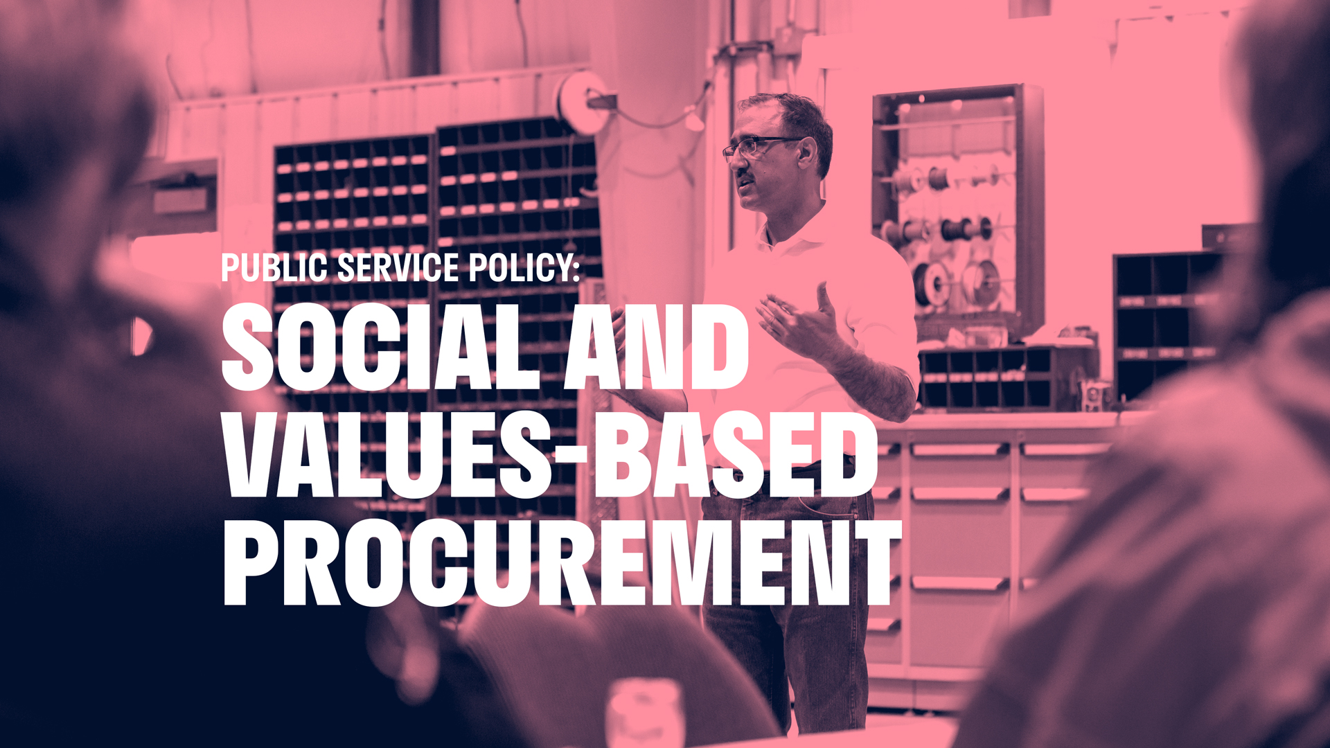 An image of Amarjeet speaking to a group of a people. The text overlay reads: "Public Services Policy: Social and Values-Based Procurement"